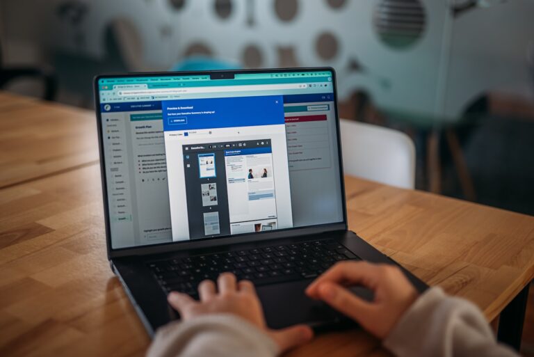 Brand-owned community platform interface on a laptop and phone showing customer engagement, support, and member...